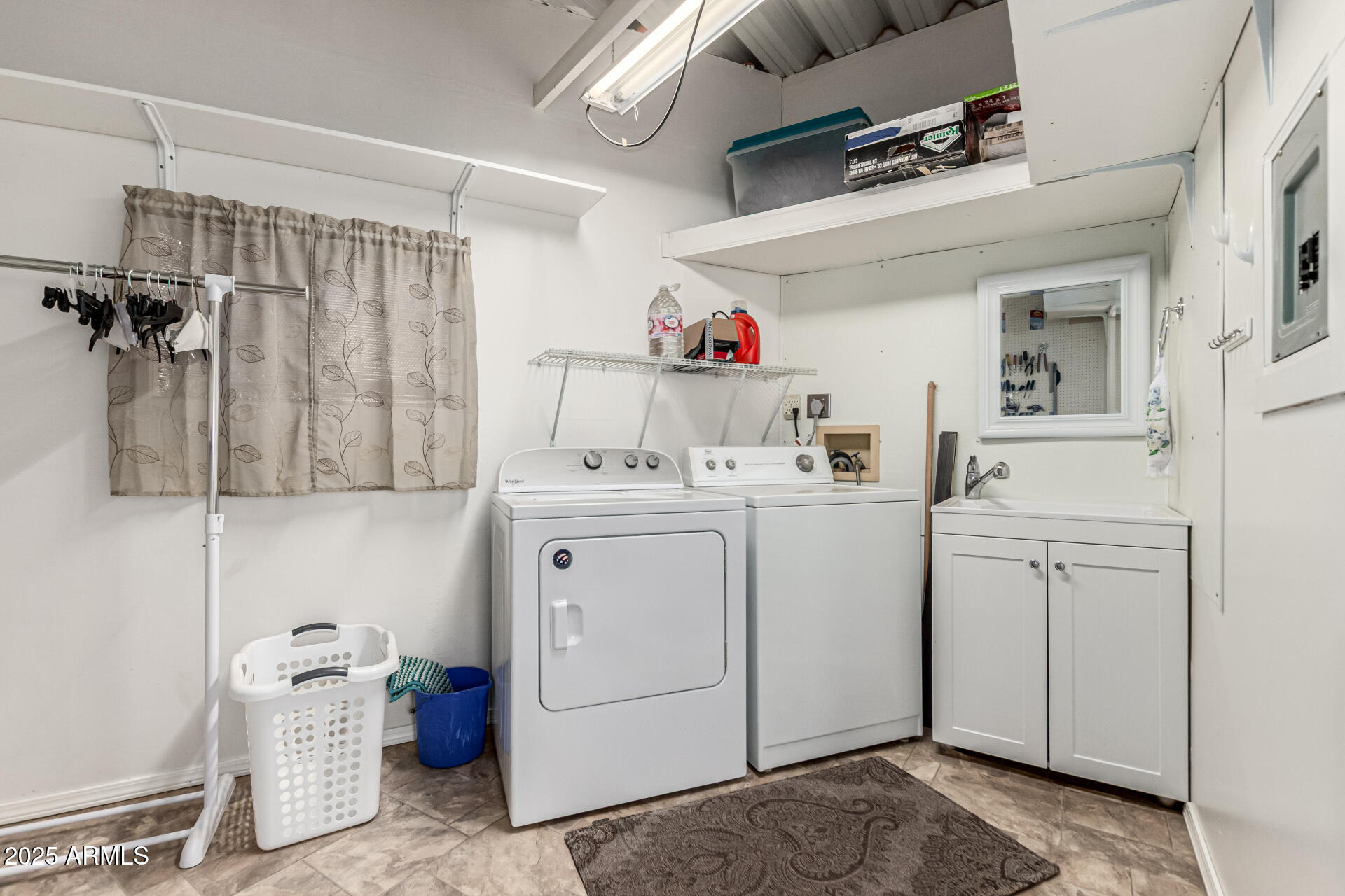 2920 South Cree Drive Apache Junction, AZ 85119 - Photo 32 of 55 a utility room with cabinets washer and dryer