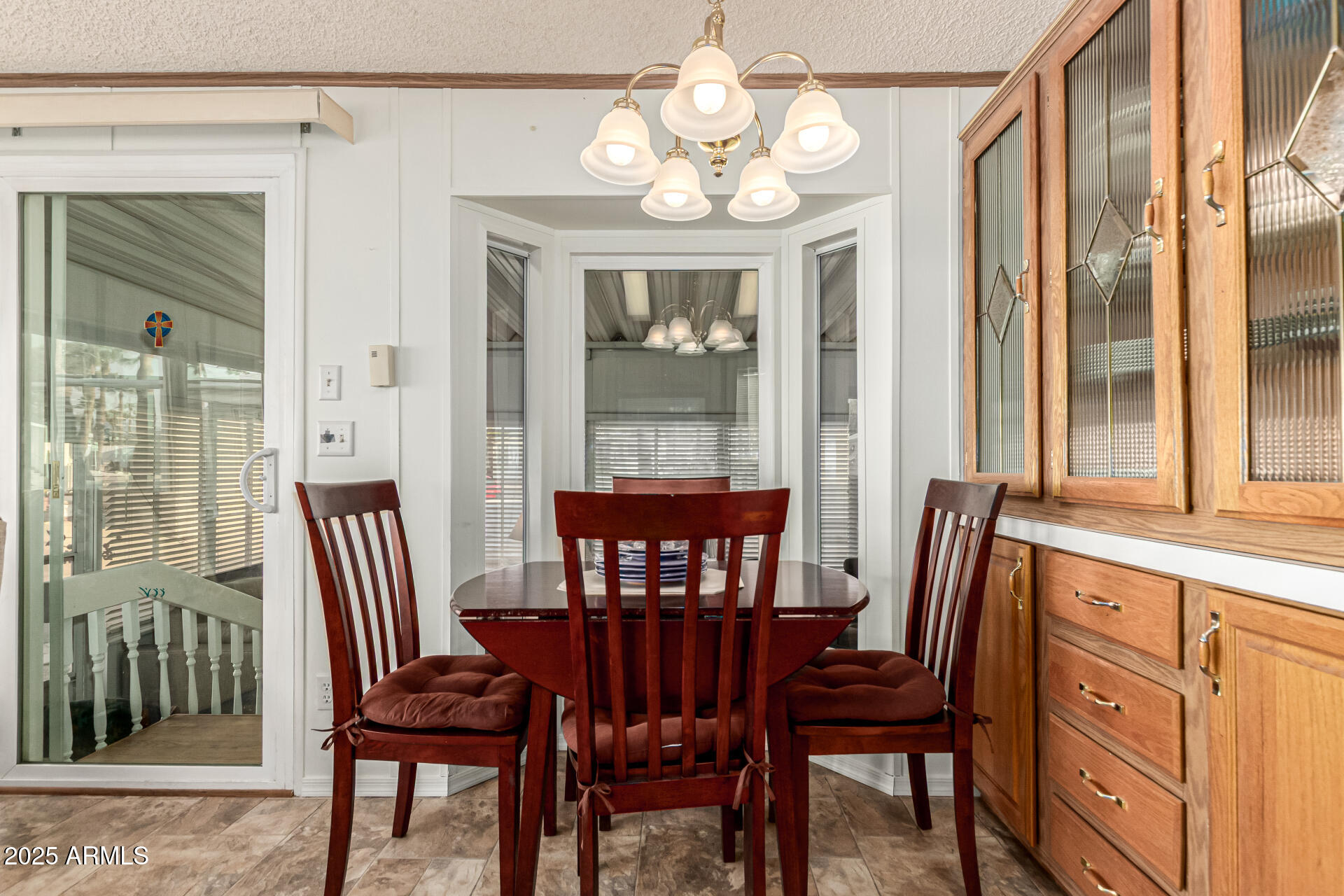 2920 South Cree Drive Apache Junction, AZ 85119 - Photo 7 of 55 a view of a dining room with furniture window and outside view