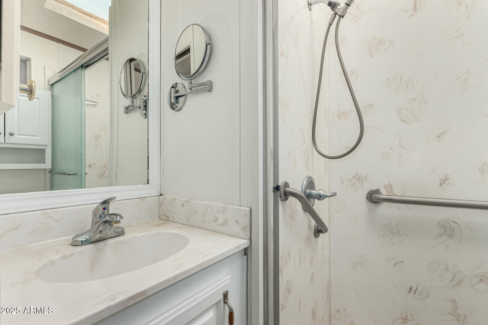 2920 South Cree Drive Apache Junction, AZ 85119 - Photo 9 of 55 a bathroom with a sink and mirror