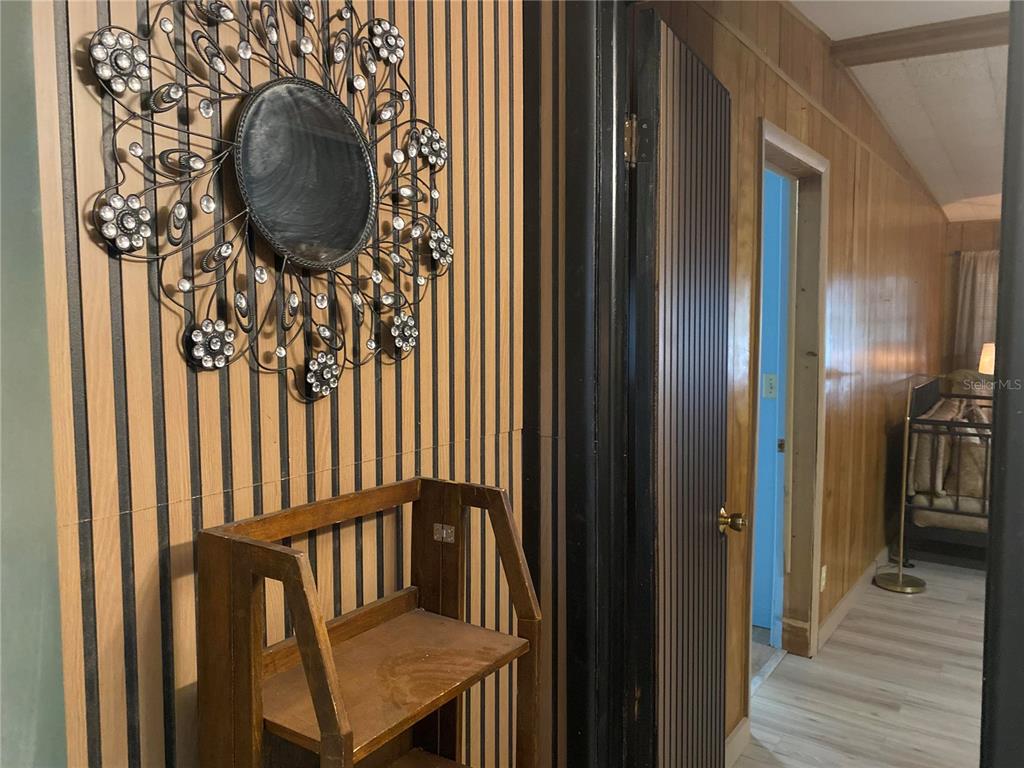 8093 Breezy Point Road East Keystone Heights, FL 32656 - Photo 20 of 34 a view of entryway with wooden floor