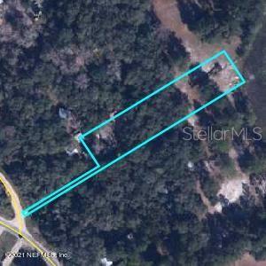 8093 Breezy Point Road East Keystone Heights, FL 32656 - Photo 2 of 34 a view of a backyard