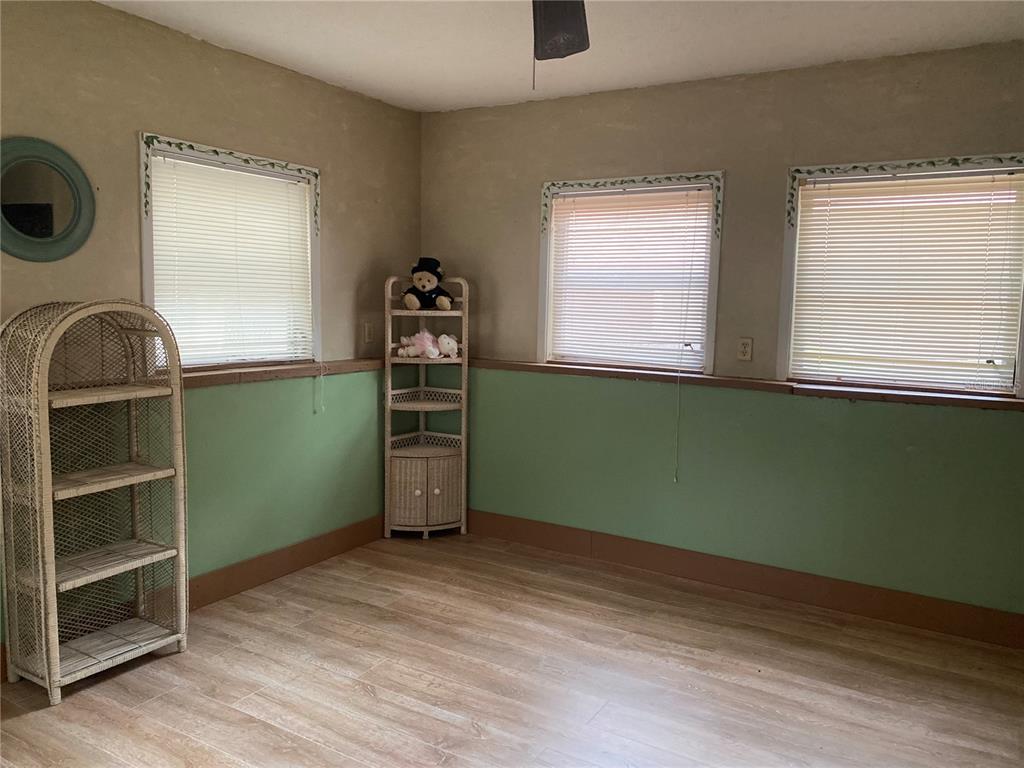 8093 Breezy Point Road East Keystone Heights, FL 32656 - Photo 29 of 34 a room with window and closet