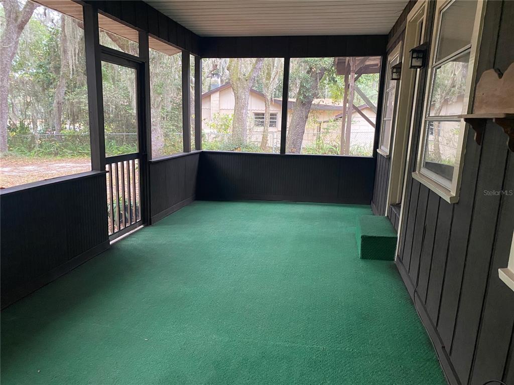 8093 Breezy Point Road East Keystone Heights, FL 32656 - Photo 6 of 34 a view of an empty room with a window