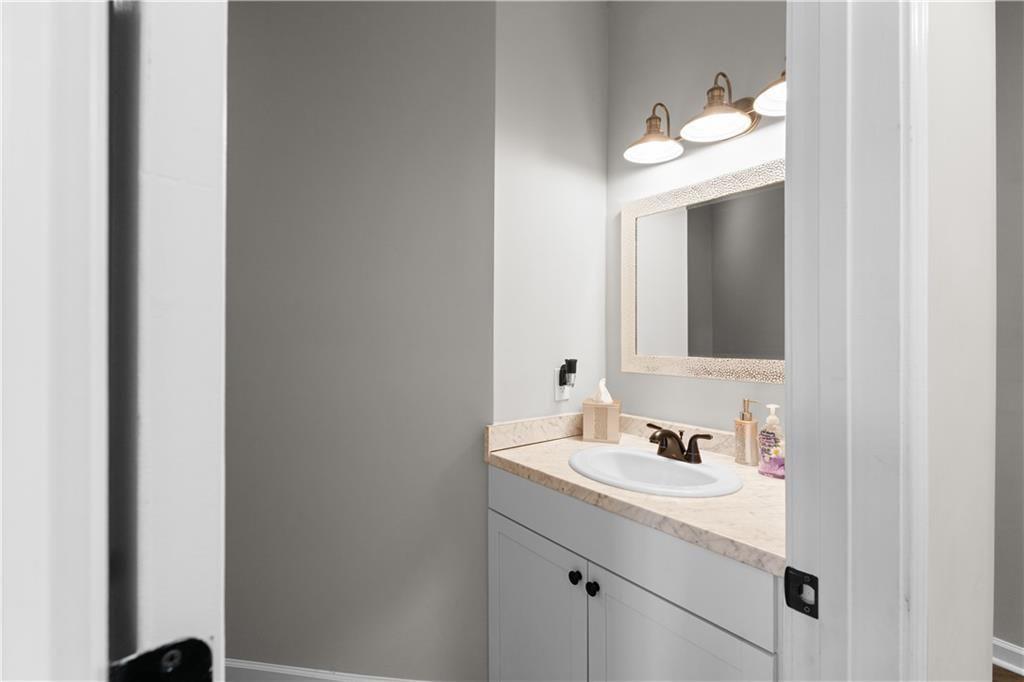 2117 Treehaven Court Decatur, GA 30035 - Photo 13 of 23 a bathroom with a sink and a mirror
