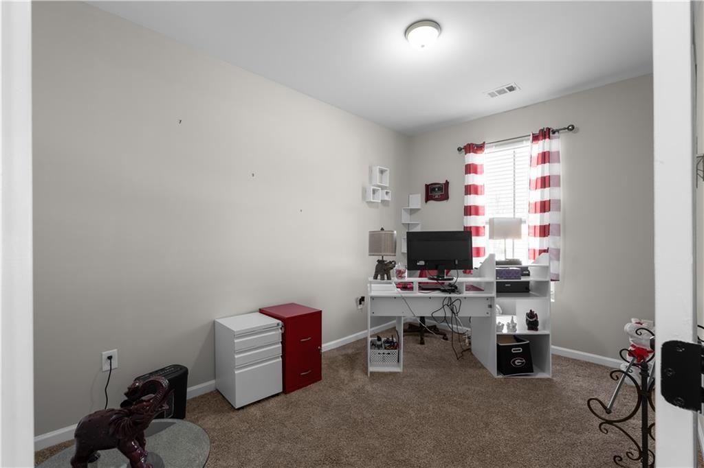 2117 Treehaven Court Decatur, GA 30035 - Photo 16 of 23 a view of a workspace with furniture
