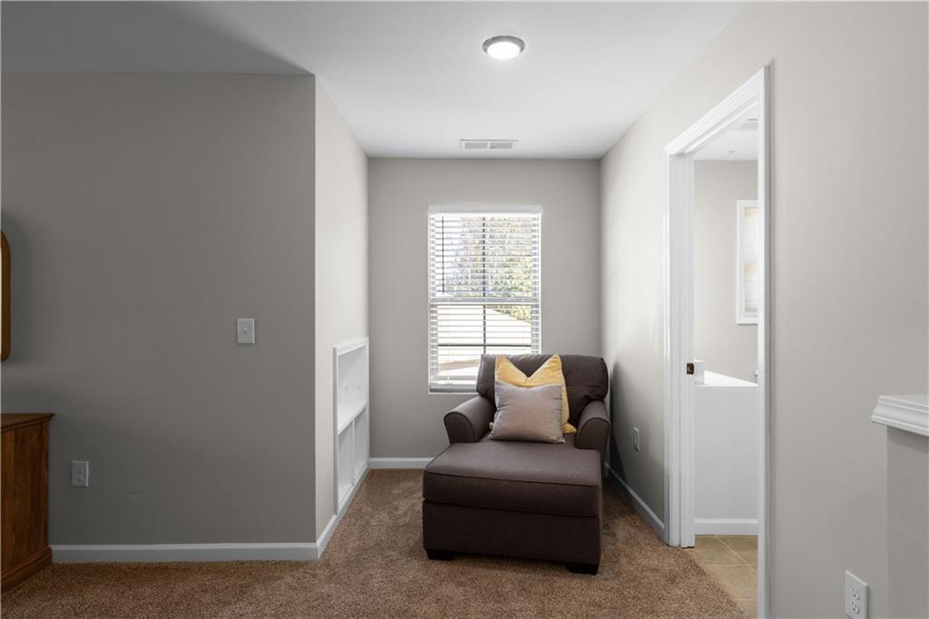 2117 Treehaven Court Decatur, GA 30035 - Photo 19 of 23 a living room with furniture and a window