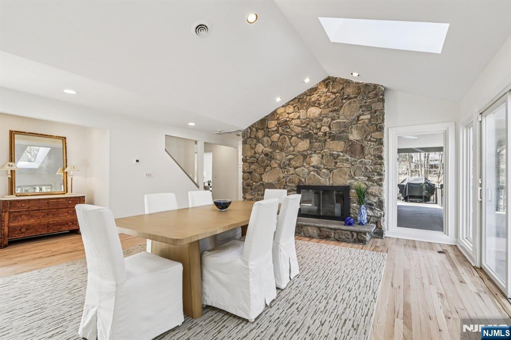 11 Carlough Road Upper Saddle River, NJ 07458 - Photo 11 of 41 a living room with furniture a fireplace and a table