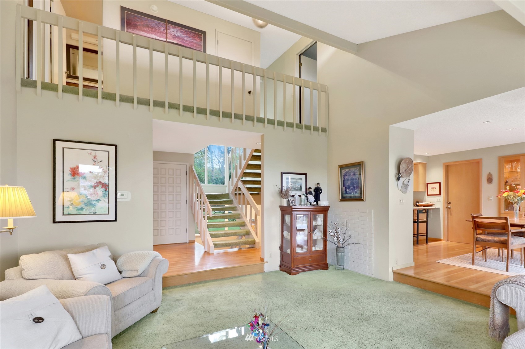 201 Middlefield Road Bellingham, WA 98225 - Photo 14 of 36 a living room with furniture and stairs