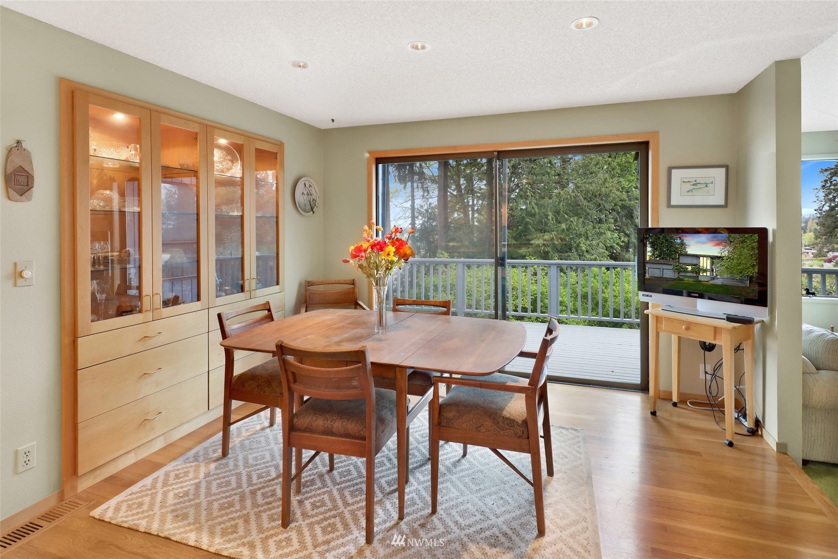 201 Middlefield Road Bellingham, WA 98225 - Photo 16 of 36 a dining room with furniture window and wooden floor