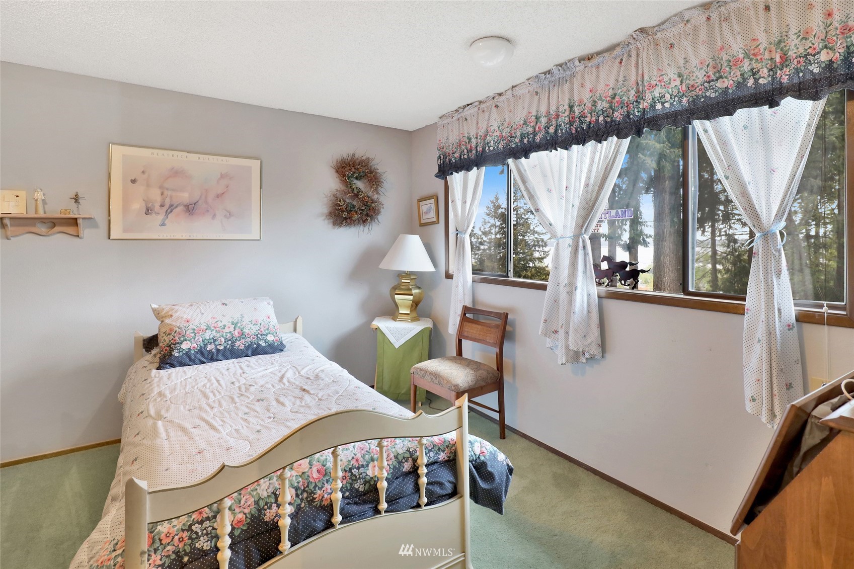 201 Middlefield Road Bellingham, WA 98225 - Photo 26 of 36 a bedroom with furniture and a window