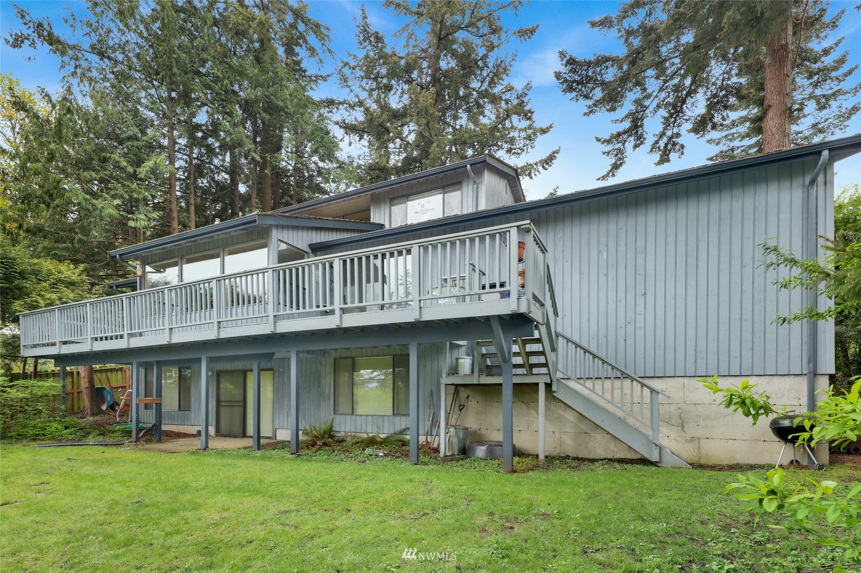 201 Middlefield Road Bellingham, WA 98225 - Photo 6 of 36 a view of an house with backyard porch and sitting area