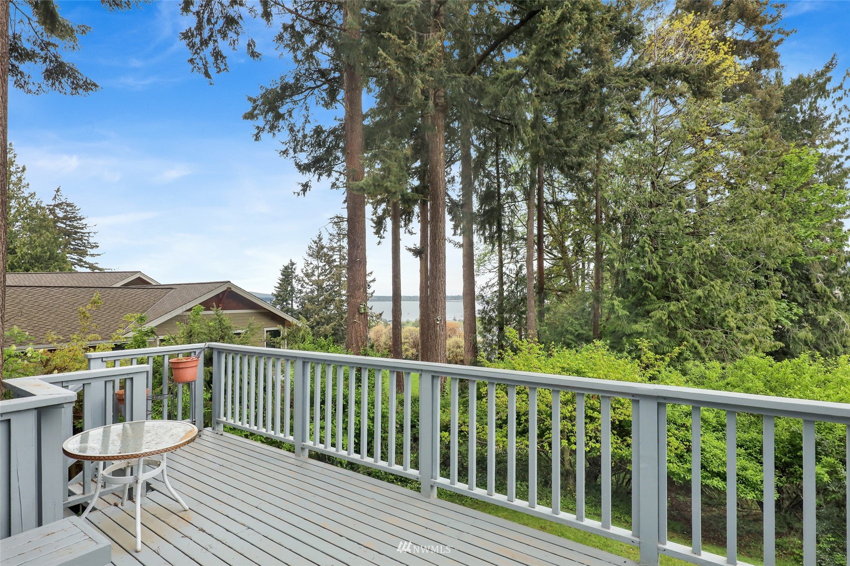 201 Middlefield Road Bellingham, WA 98225 - Photo 8 of 36 a view of a balcony with mountain view and wooden floor