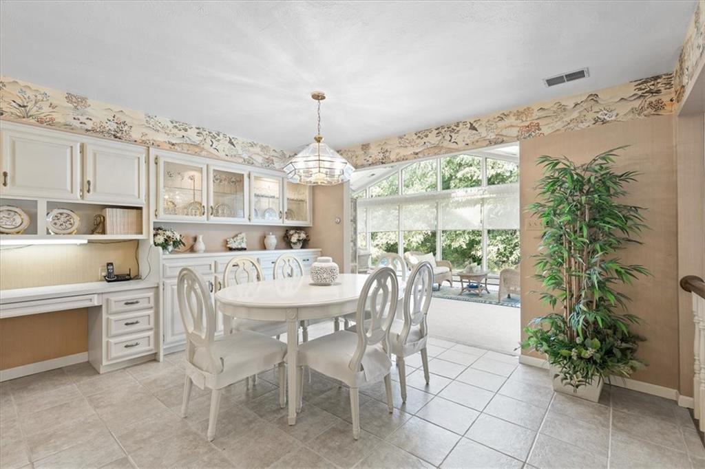 18 Timbercrest Circle Cecil, PA 15321 - Photo 11 of 48 a view of a dining room with furniture window and wooden floor
