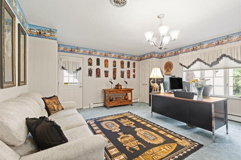 18 Timbercrest Circle Cecil, PA 15321 - Photo 18 of 48 a living room with furniture and a chandelier