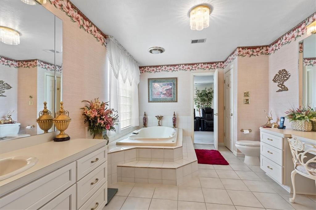 18 Timbercrest Circle Cecil, PA 15321 - Photo 23 of 48 a spacious bathroom with a double vanity sink mirror and bathtub