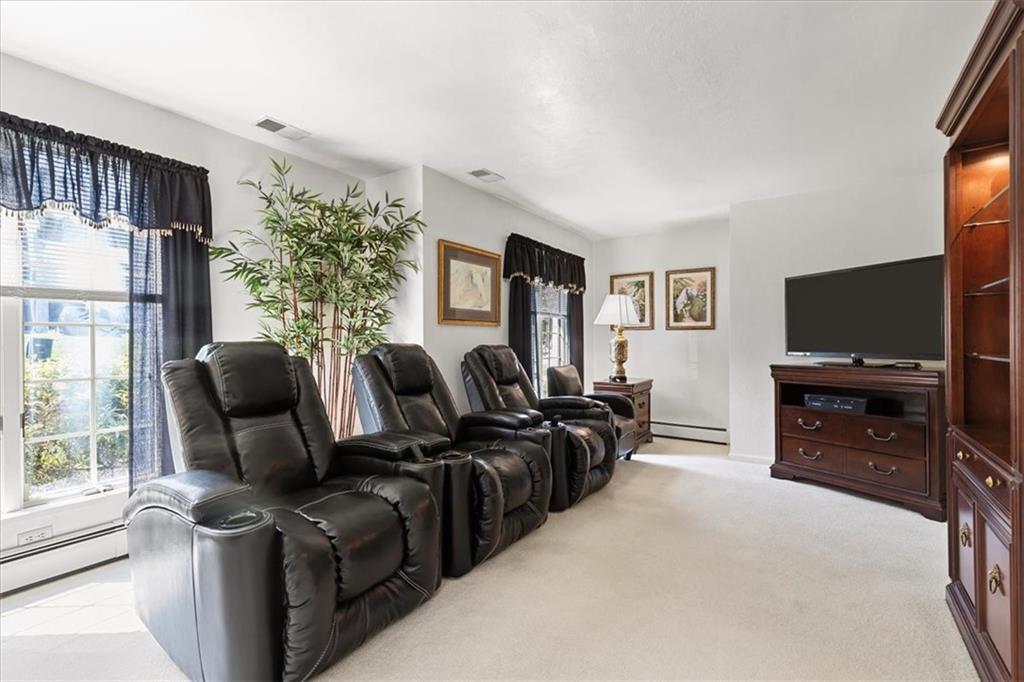 18 Timbercrest Circle Cecil, PA 15321 - Photo 25 of 48 a view of a livingroom with furniture and a flat screen tv