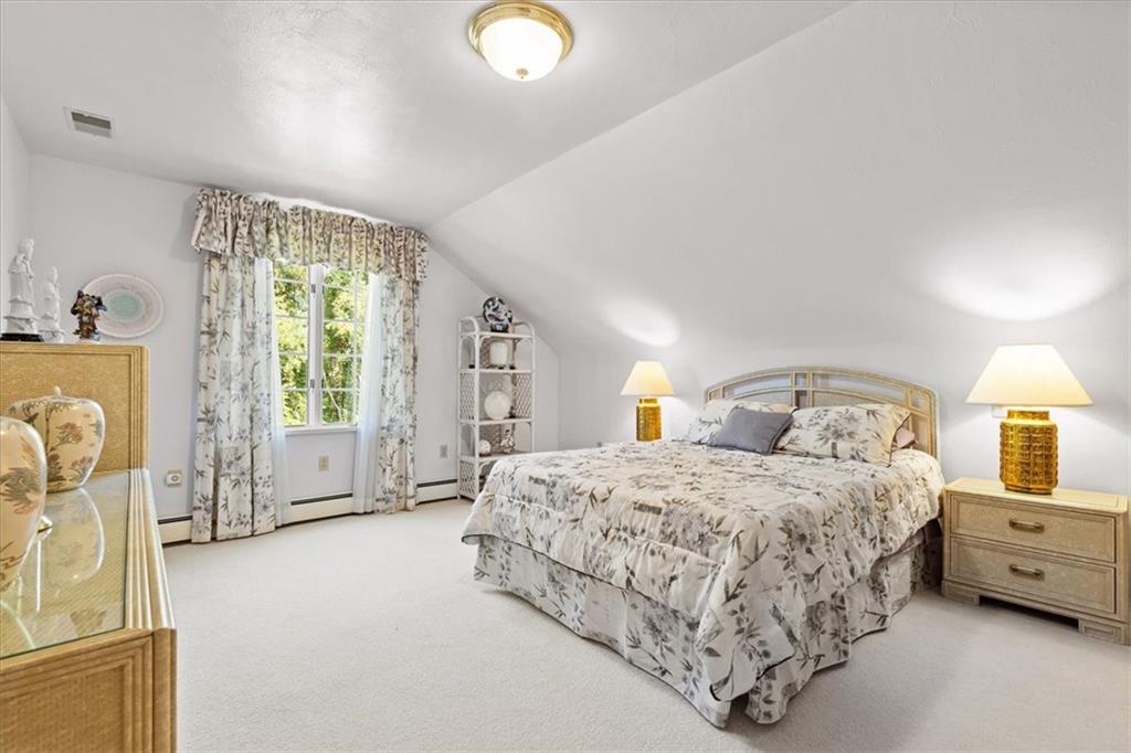 18 Timbercrest Circle Cecil, PA 15321 - Photo 29 of 48 a spacious bedroom with a bed mirror and window