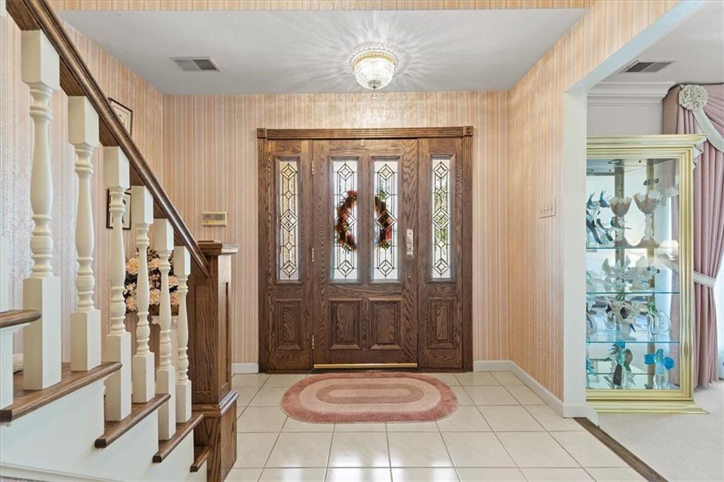 18 Timbercrest Circle Cecil, PA 15321 - Photo 3 of 48 a view of an entryway with wooden floor and door