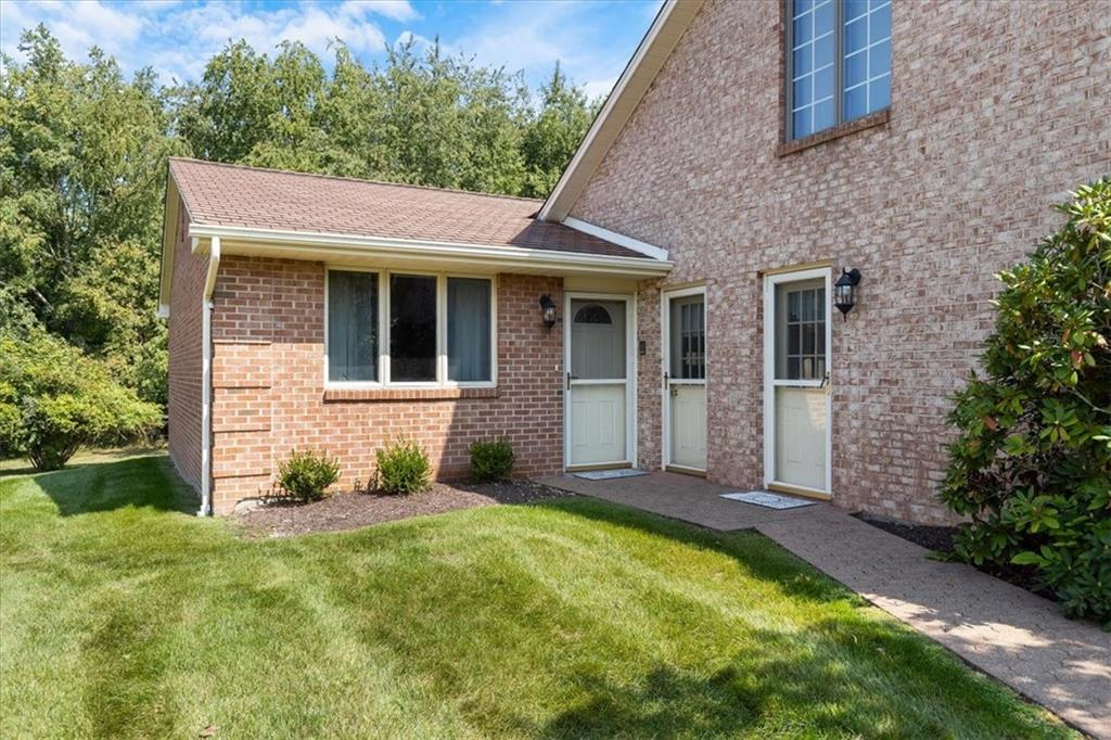 18 Timbercrest Circle Cecil, PA 15321 - Photo 44 of 48 a view of a house with brick walls and a yard with plants