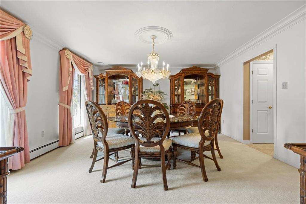 18 Timbercrest Circle Cecil, PA 15321 - Photo 7 of 48 a view of a dining room with furniture and chandelier
