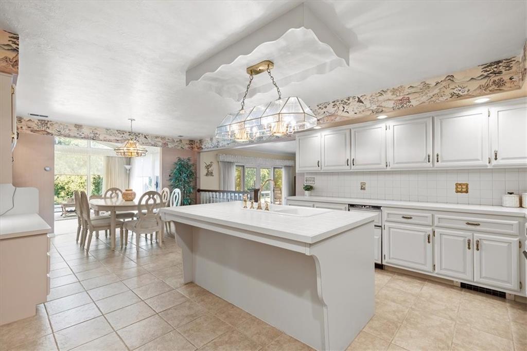 18 Timbercrest Circle Cecil, PA 15321 - Photo 8 of 48 a large white kitchen with a large island