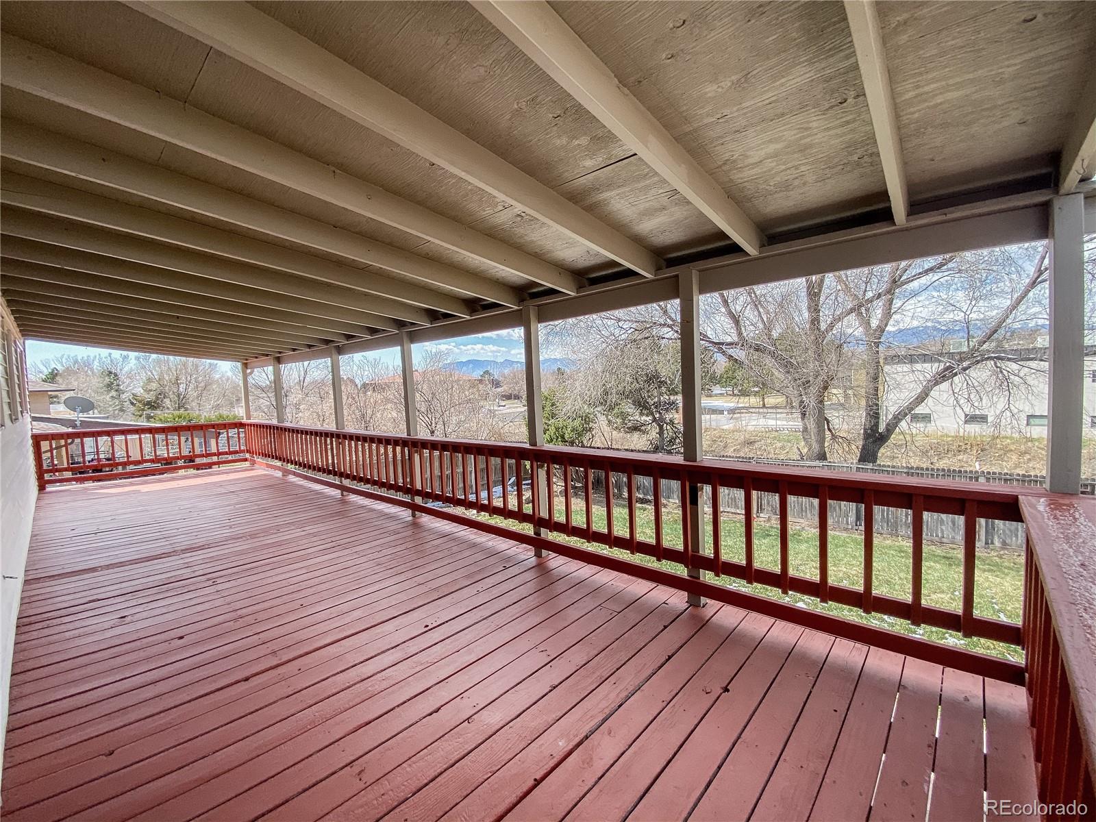 2214 Wold Avenue Colorado Springs, CO 80909 - Photo 16 of 38 a view of hallway with wooden floor