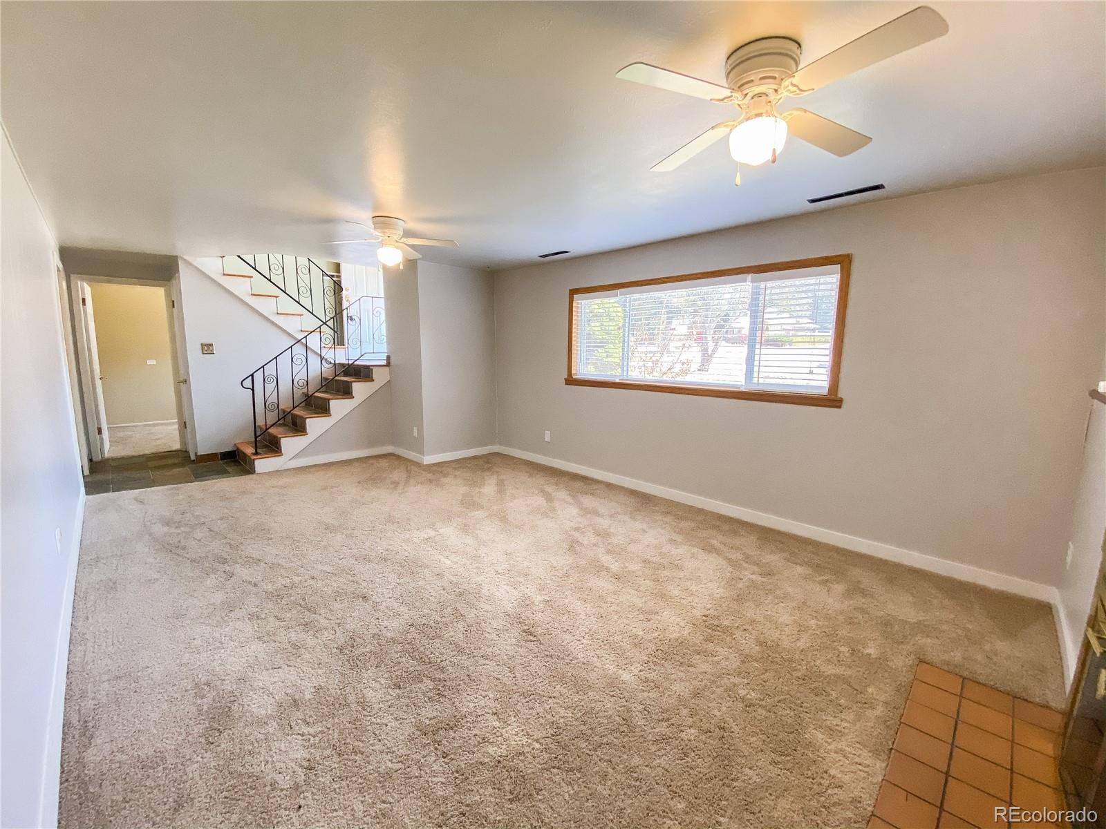 2214 Wold Avenue Colorado Springs, CO 80909 - Photo 31 of 38 a view of an empty room with a window