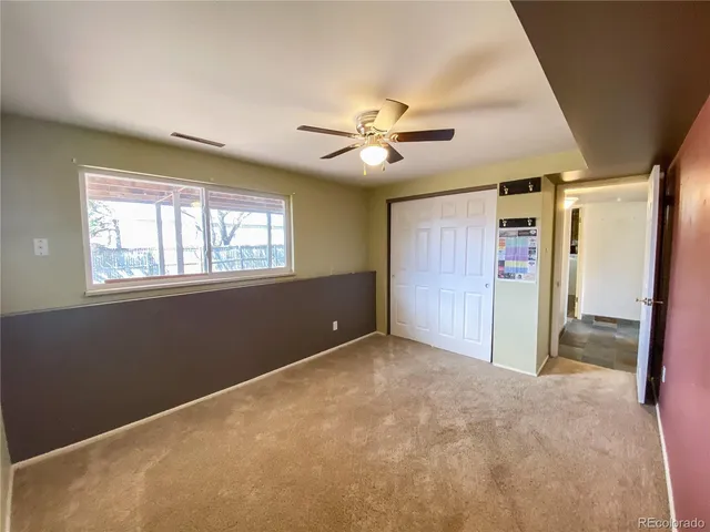 a kitchen that has a sink and a stove