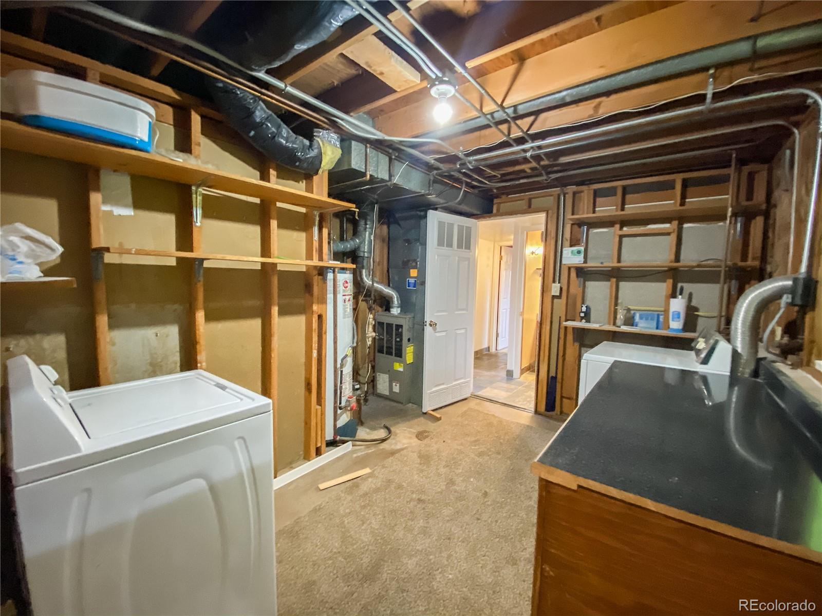 2214 Wold Avenue Colorado Springs, CO 80909 - Photo 37 of 38 a view of a storage & utility room