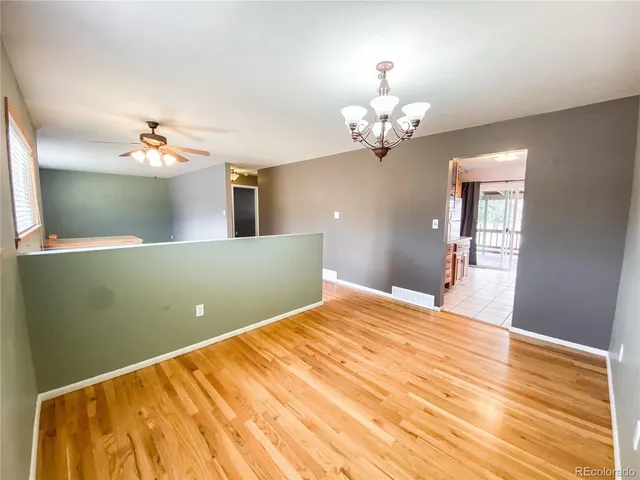 a view of a bedroom with a chandelier