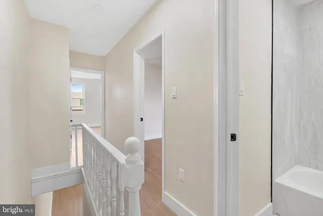 a view of a bathroom from the hallway