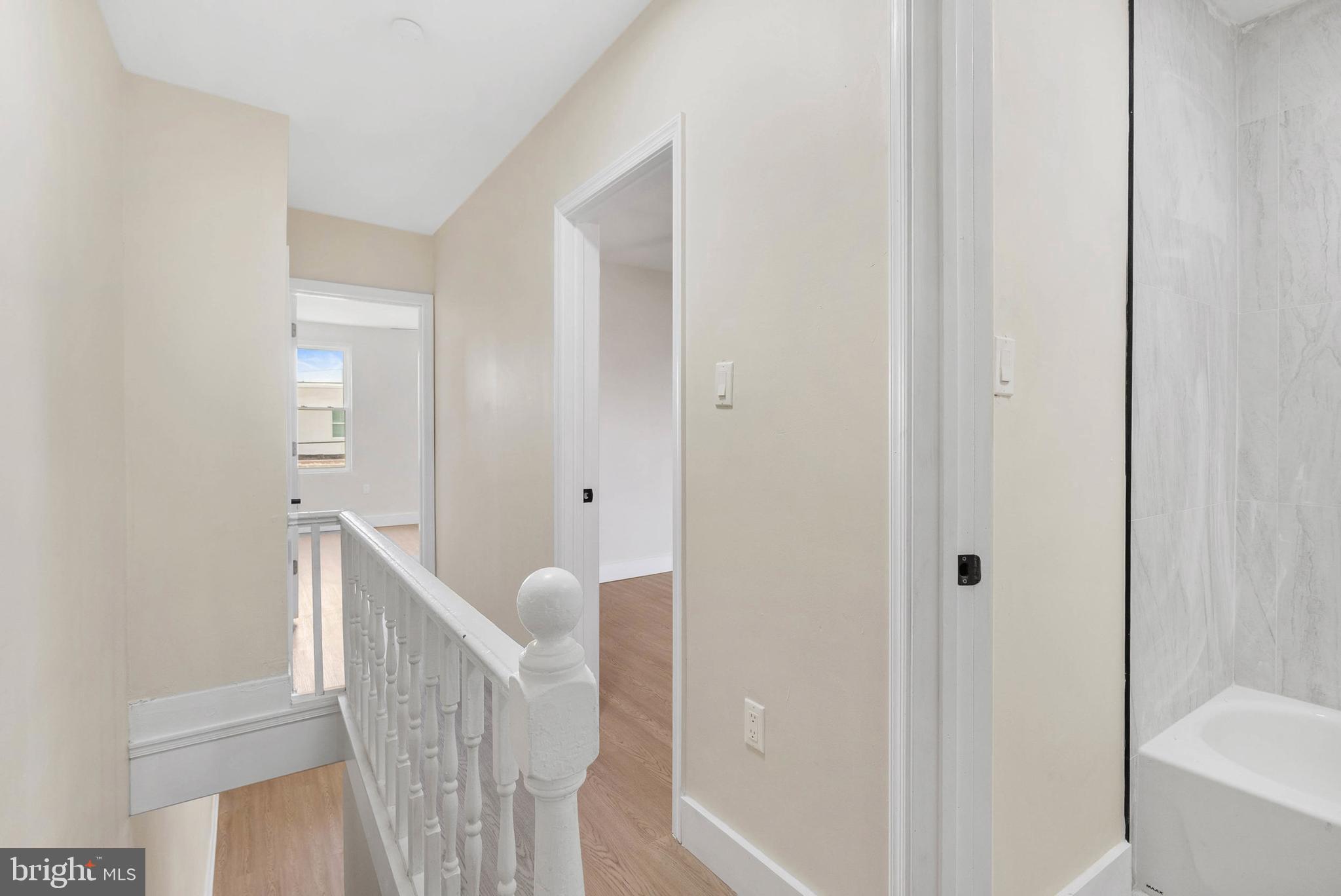 1221 North 50th Street Philadelphia, PA 19131 - Photo 12 of 24 a view of a bathroom from the hallway