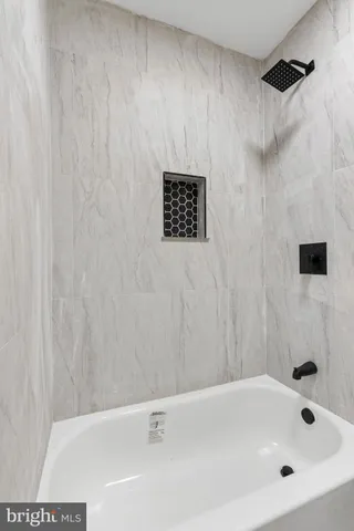 a bathroom with a bathtub
