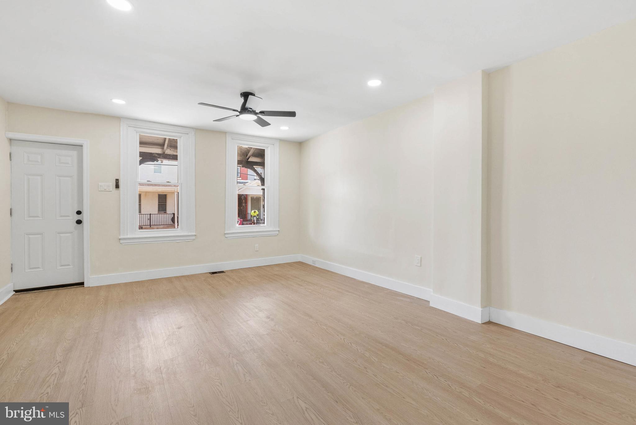 1221 North 50th Street Philadelphia, PA 19131 - Photo 5 of 24 wooden floor in an empty room with a window