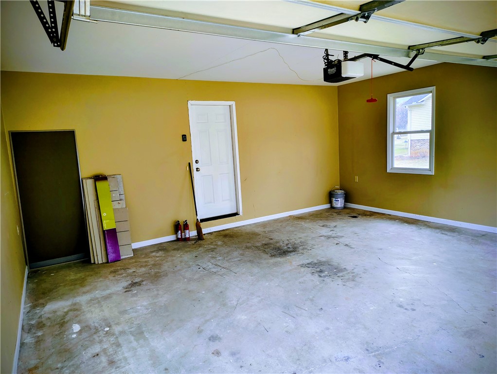 1809 Busby Road Anderson, SC 29626 - Photo 34 of 43 This spacious garage offers ample storage and direct access, perfect for convenience.