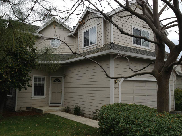 150 Redding Road Campbell, CA 95008 - Photo 1 of 18 a front view of a house with a yard and garage