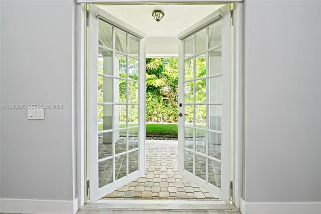 a view of a room with windows