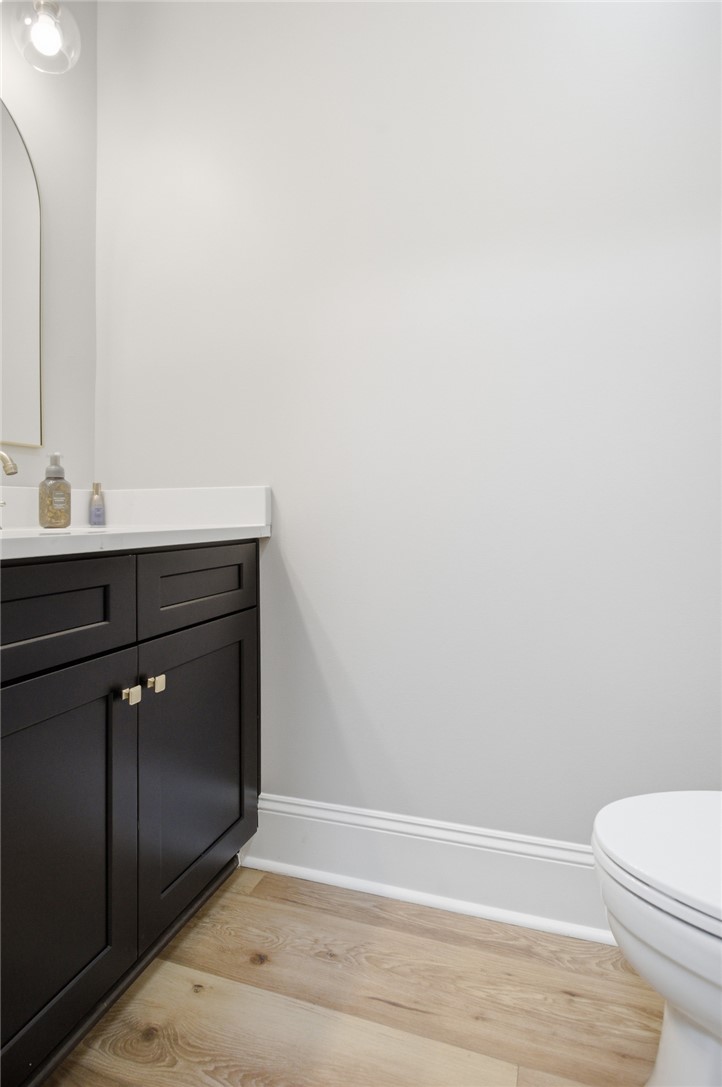 147 McAlister Road West Union, SC 29696 - Photo 25 of 49 This clean and bright half bathroom features a modern vanity and durable flooring.