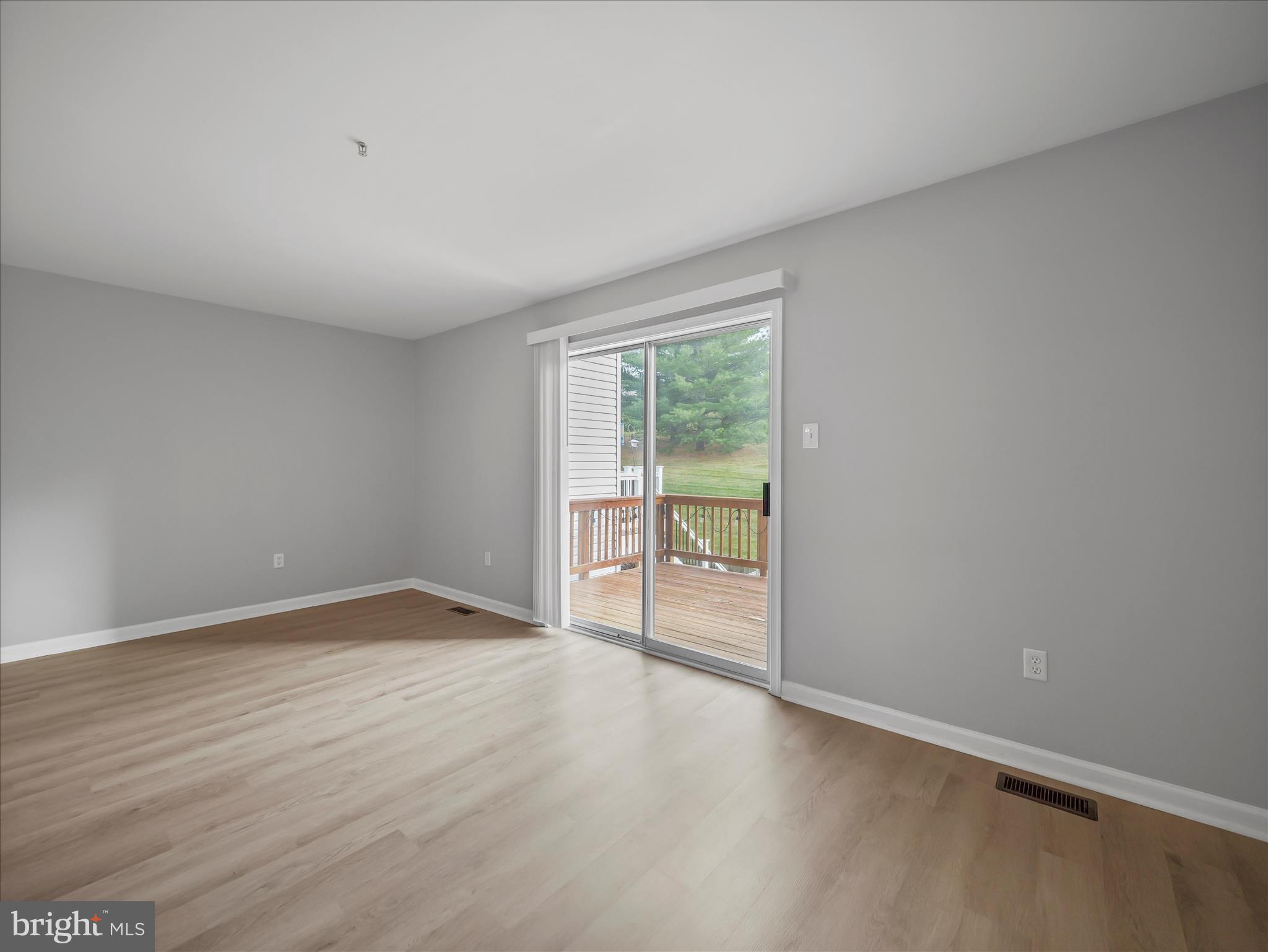 121 Eagles Ridge Smithsburg, MD 21783 - Photo 14 of 33 a view of an empty room with wooden floor and a window