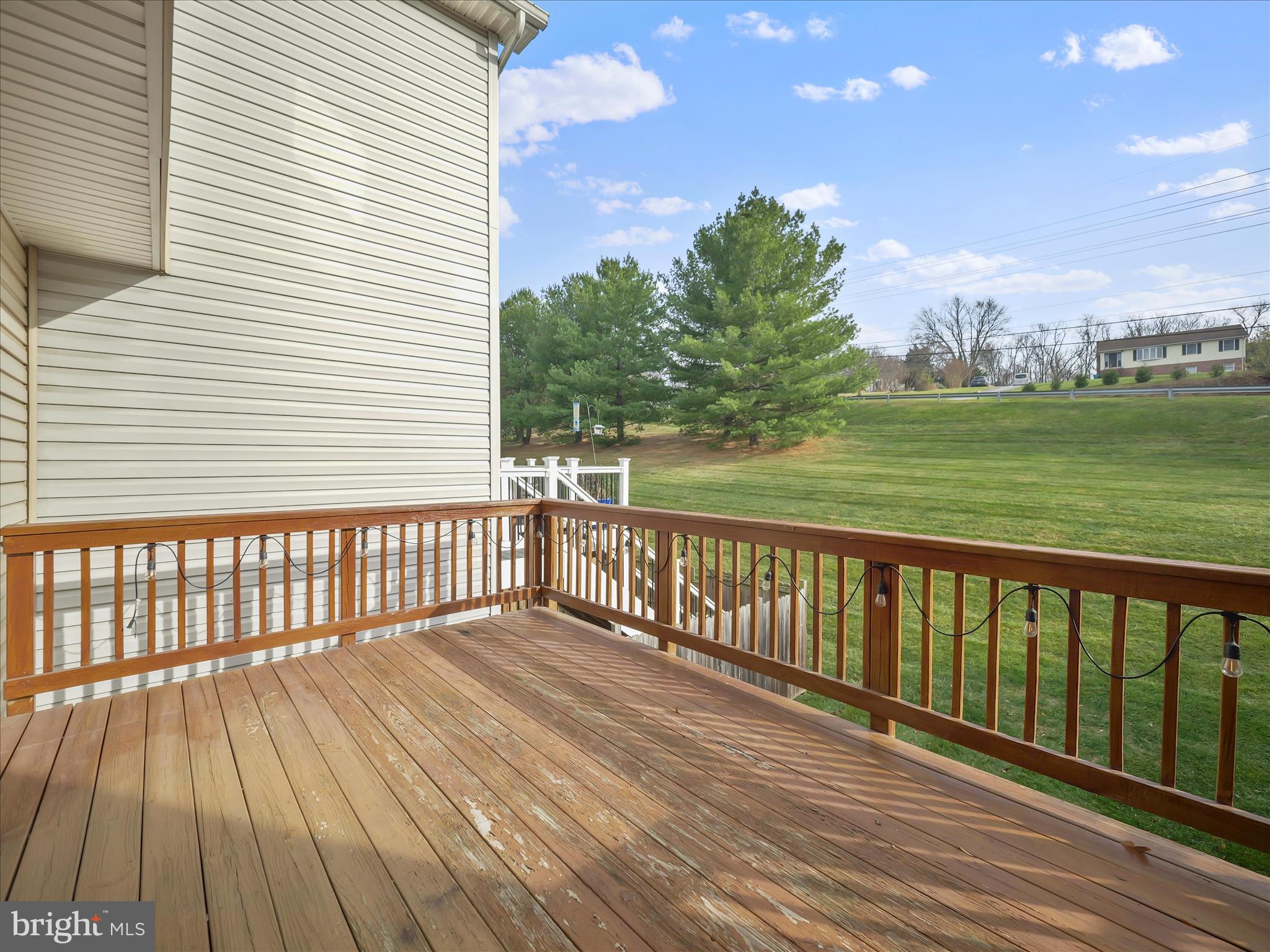 121 Eagles Ridge Smithsburg, MD 21783 - Photo 16 of 33 a balcony with wooden floor and fence