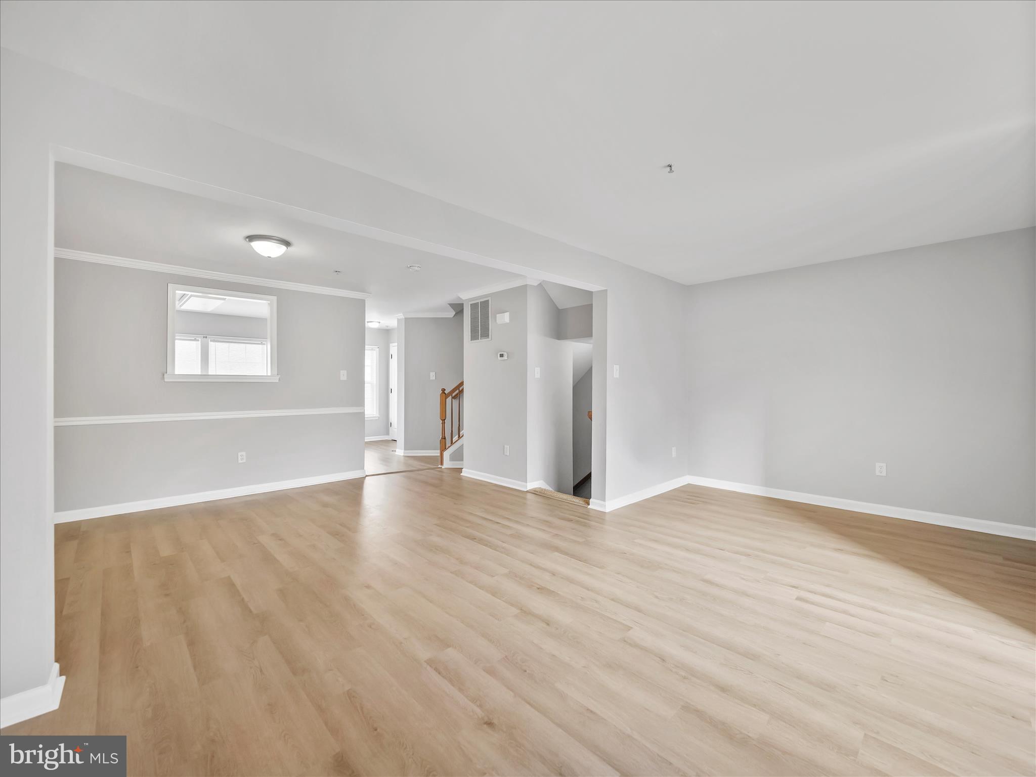 121 Eagles Ridge Smithsburg, MD 21783 - Photo 20 of 33 a view of an empty room with wooden floor and a window