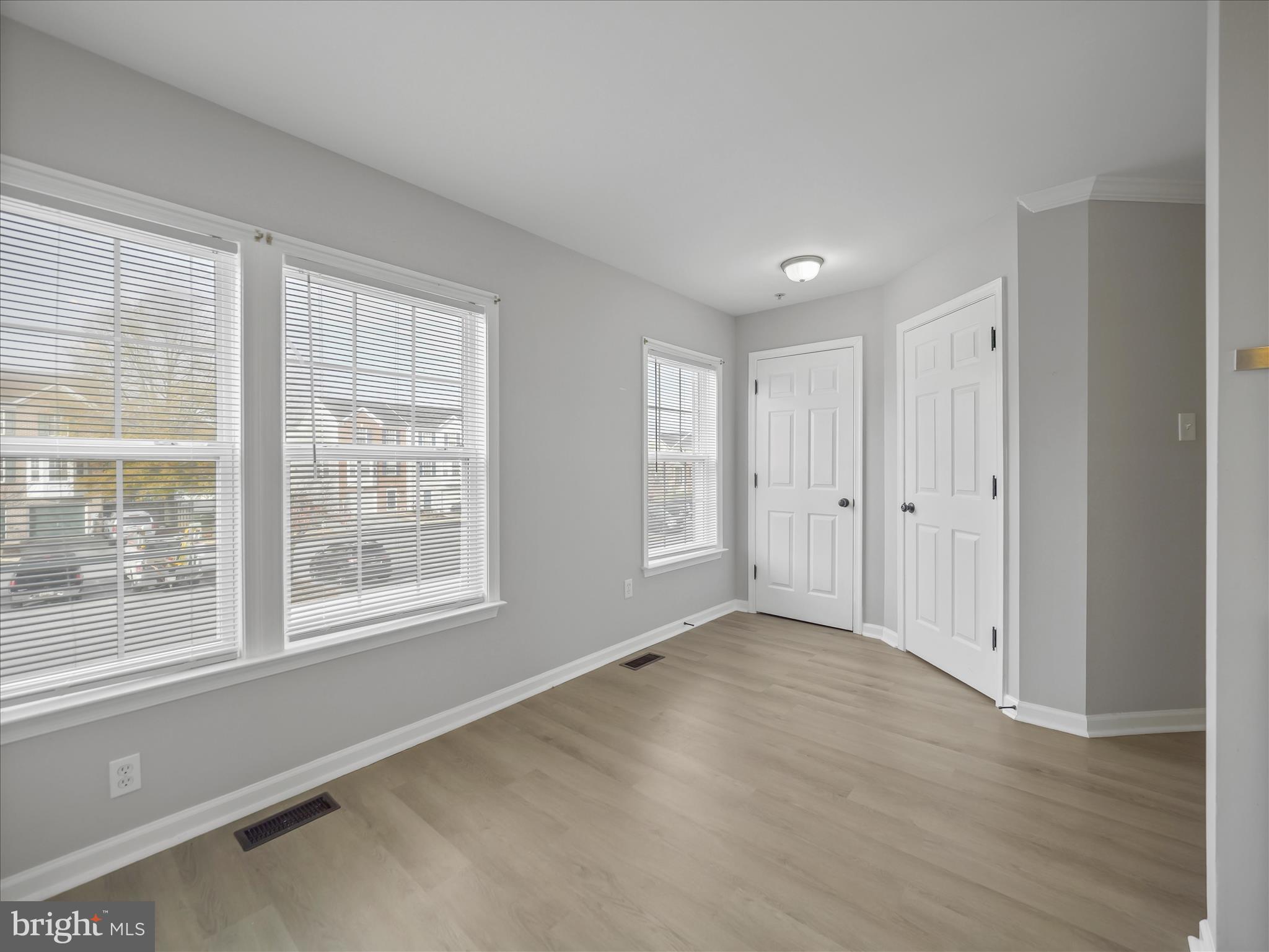 121 Eagles Ridge Smithsburg, MD 21783 - Photo 6 of 33 a view of an empty room with wooden floor and a window