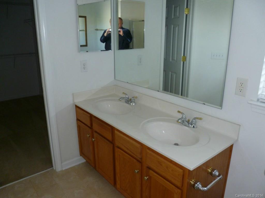 7629 Black Hawk Lane, Unit 43 Tega Cay, SC 29708 - Photo 8 of 18 a bathroom with a sink and a mirror