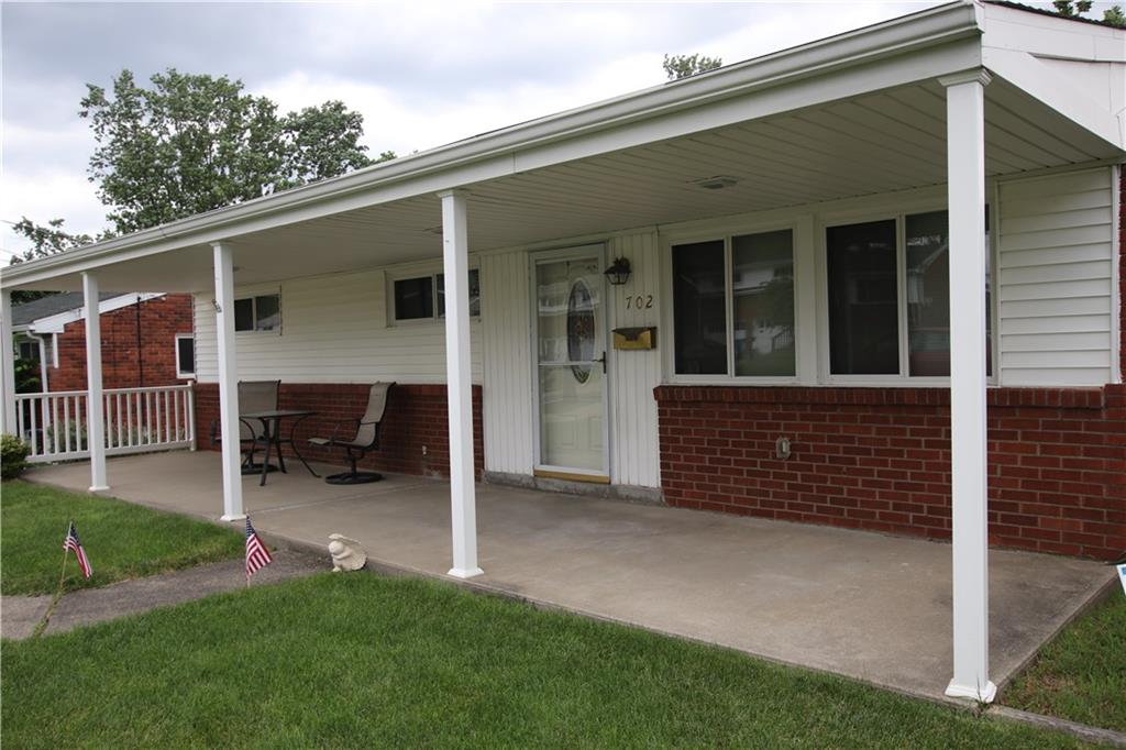 702 Lindsay Road Carnegie, PA 15106 - Photo 2 of 17 Relax on the spacious covered front porch.