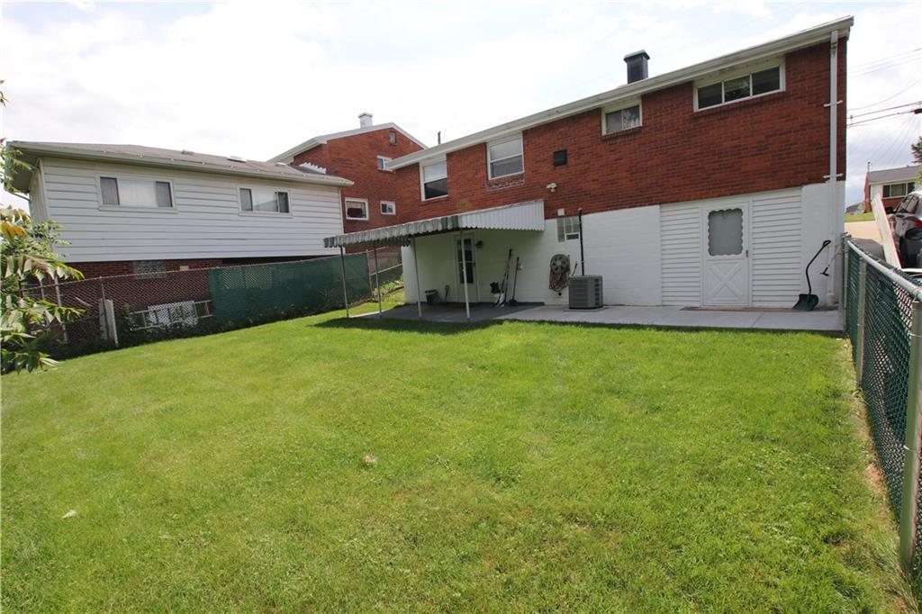 702 Lindsay Road Carnegie, PA 15106 - Photo 14 of 17 Large fenced in back yard... great for kids and pets.