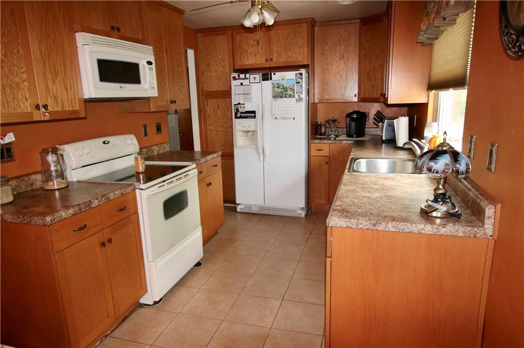 702 Lindsay Road Carnegie, PA 15106 - Photo 4 of 17 Remodeled kitchen with ample cabinets and lots of counter space for cooking.