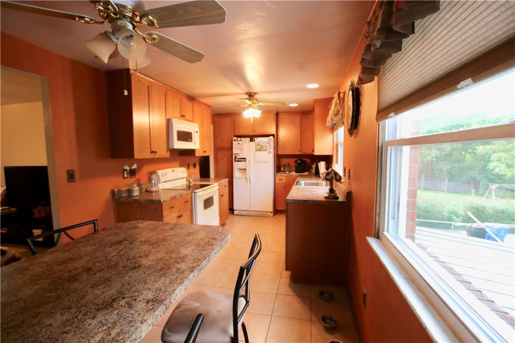 702 Lindsay Road Carnegie, PA 15106 - Photo 5 of 17 Built in matching table in the Kitchen
