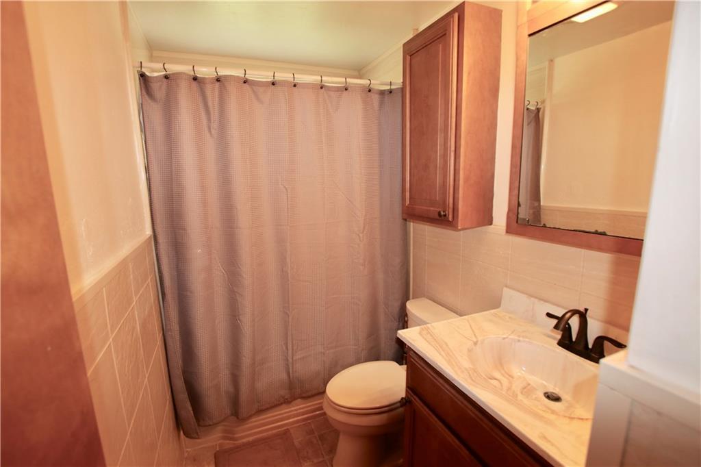 702 Lindsay Road Carnegie, PA 15106 - Photo 9 of 17 Remodeled main level full bathroom
