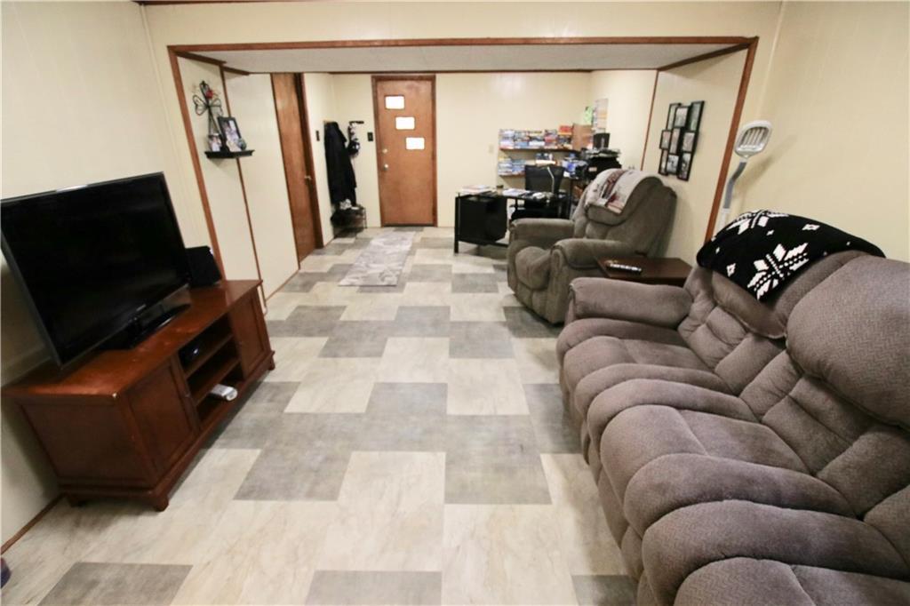 702 Lindsay Road Carnegie, PA 15106 - Photo 10 of 17 Finished basement Family Room with newer flooring.