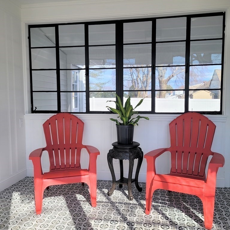 114 Conant Street Danvers, MA 01923 - Photo 14 of 29 a workspace with furniture and a potted plant